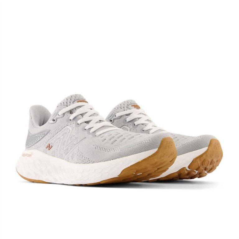 women's running course shoes in gray white