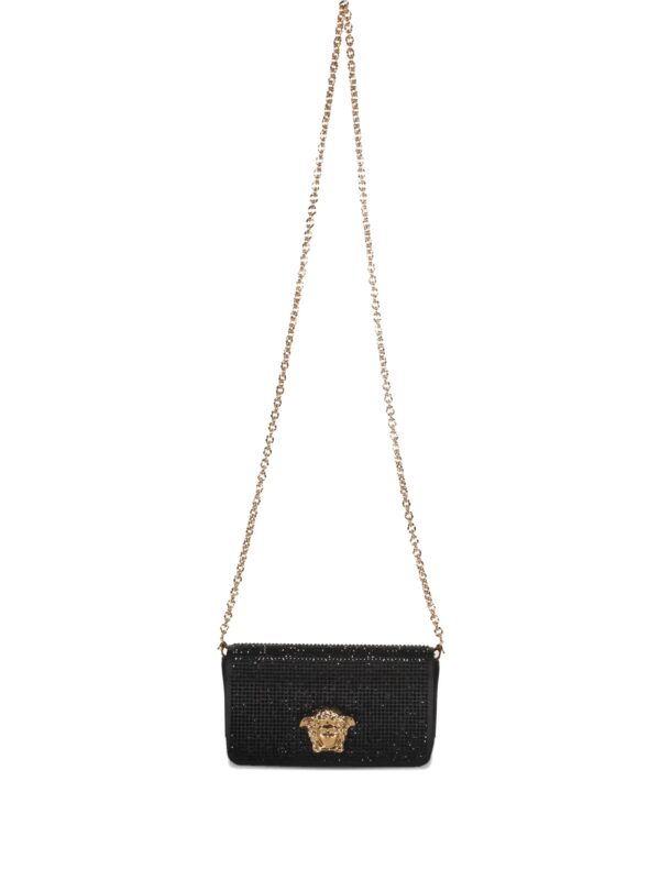 embelished black clutch with golden closure