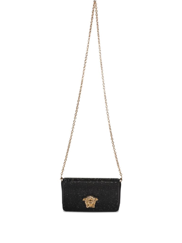 embelished black clutch with golden closure