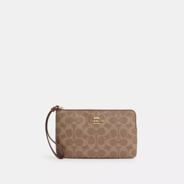 large corner zip wristlet in signature canvas