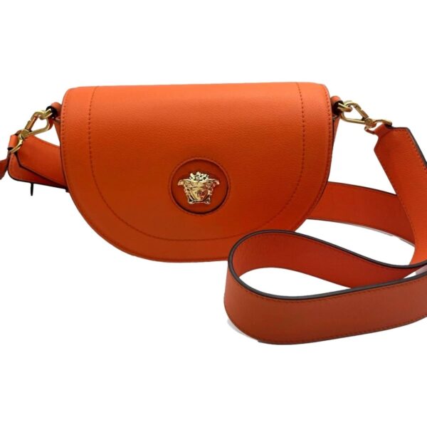 women's half-moon la medusa vitello leather crossbody handbag in pumpkin orange