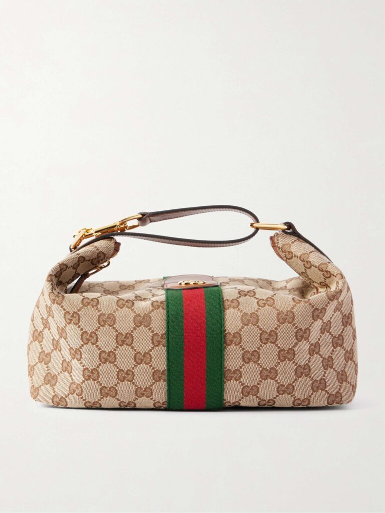 Ophidia leather-trimmed striped coated-canvas clutch